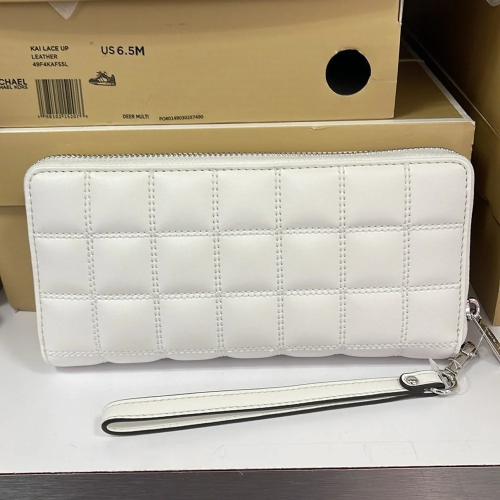 MICHAEL KORS
Continental Wristlet Phone Case Wallet
Optic White
NWT - Picture 4 of 16